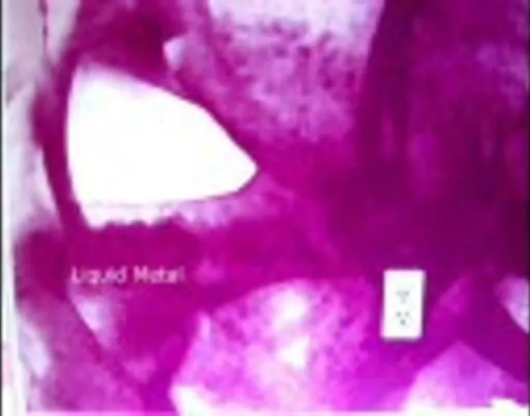 File:(spilled 4 minutes from)Liquid Metal.jpg