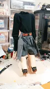 黑色套头衫和裤裙